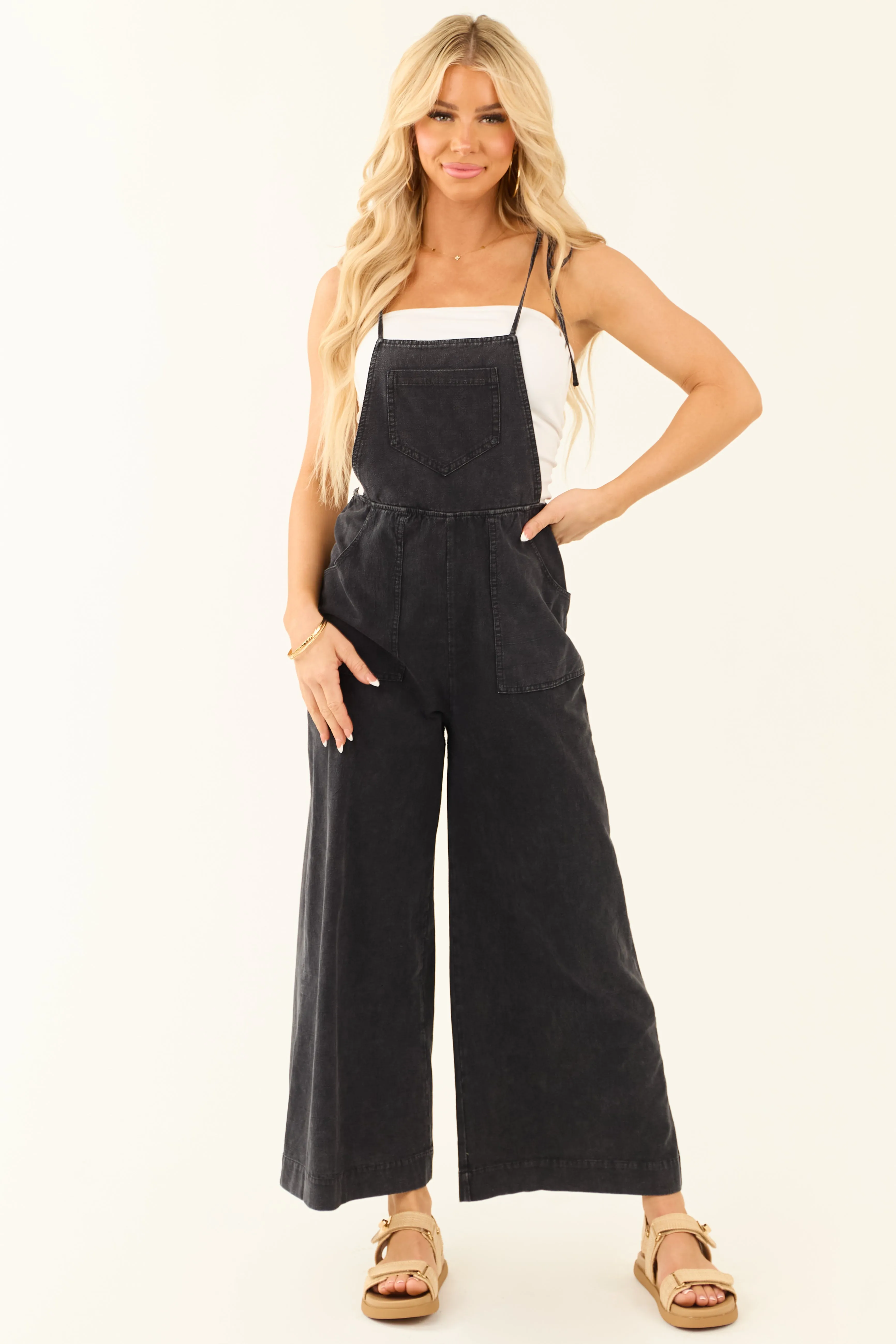 2/28/2025,ALL_PRODUCTS,back-in-stock:true,filter-color:Black,filter-fabric:Cotton,filter-fabric:Denim,filter-neckline:Square,filter-pattern:Solid,filter-season:Spring,filter-season:Summer,filter-sleeve:Sleeveless,gpc:Dresses,pc:Rompers_Jumpsuits,Reg-Price