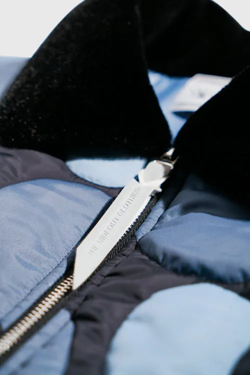 Camouflage Shearling Puffer Jacket layered look