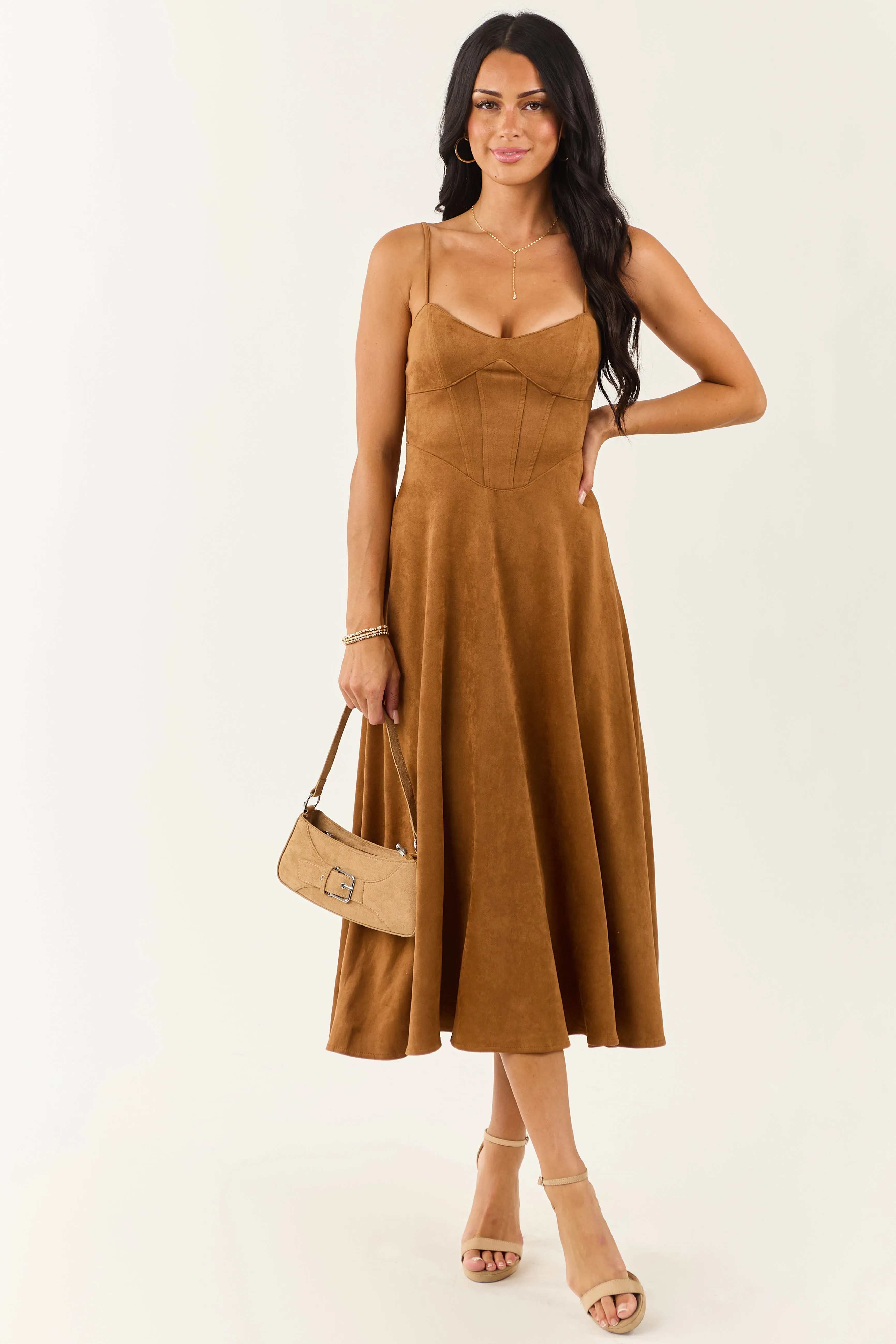 8/1/2025,ALL_PRODUCTS,back-in-stock:true,filter-color:Brown,filter-fabric:Faux Leather,filter-neckline:Sweetheart,filter-pattern:Solid,filter-season:Fall,filter-sleeve:Sleeveless,gpc:Dresses,pc:Midi_Dresses,Reg-Price