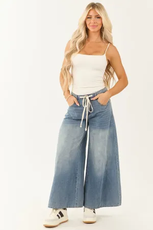 8/5/2025,ALL_PRODUCTS,back-in-stock:true,filter-color:Blue,filter-fabric:Cotton,filter-fabric:Denim,filter-inseam:28",filter-rise:High Rise,filter-season:Summer,filter-style:Ankle/Cropped,filter-style:Non-Distressed,filter-style:Wide Leg,filter-wash:M